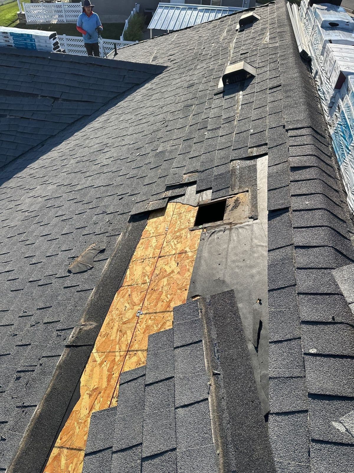 Old shingles being stripped